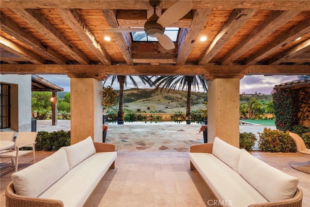 view of patio / terrace with an outdoor hangout area and ceiling fan