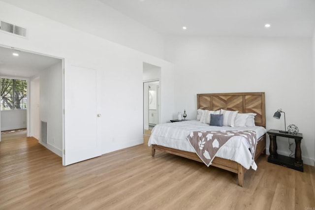 bedroom featuring recessed lighting, visible vents, and light wood finished floors