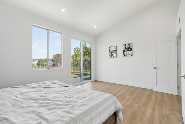 bedroom with recessed lighting, light wood-style floors, vaulted ceiling, baseboards, and access to exterior