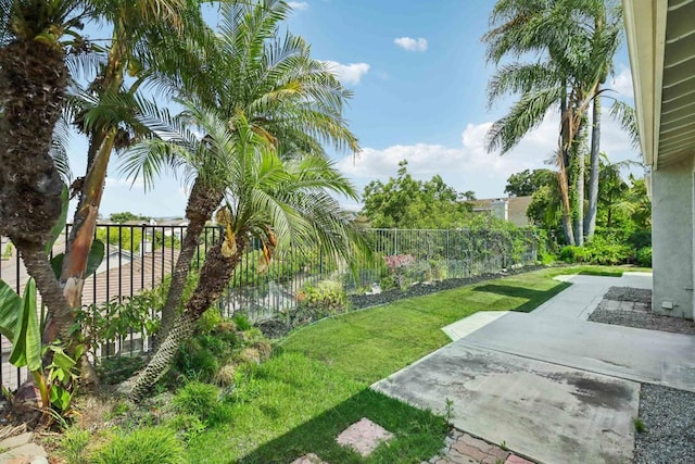 view of yard with a patio area and fence