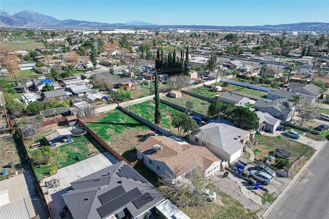 birds eye view of property with a residential view and a mountain view