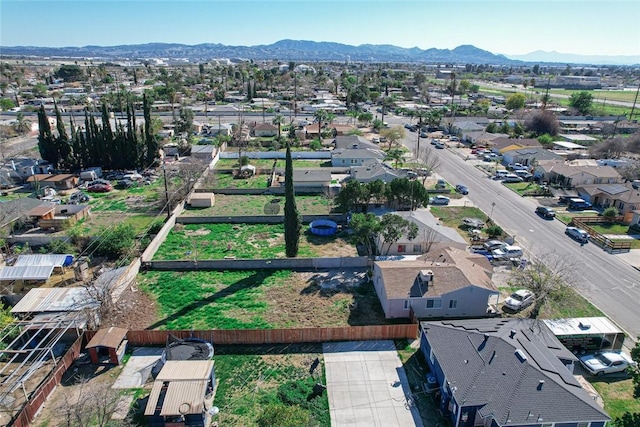 bird's eye view with a residential view and a mountain view