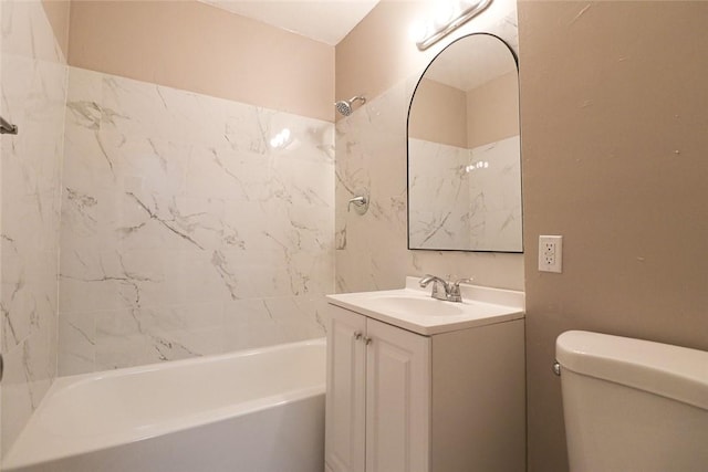 bathroom with bathing tub / shower combination, vanity, and toilet