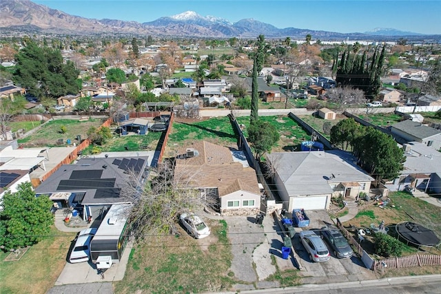 birds eye view of property featuring a residential view and a mountain view