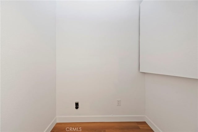 interior space with light wood-type flooring and baseboards