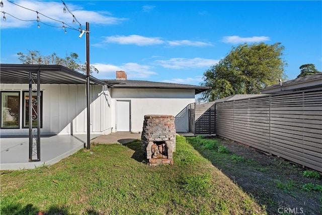 view of yard featuring a patio area and fence