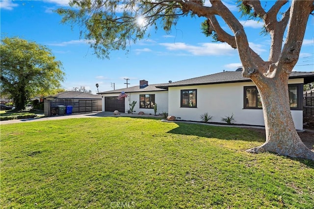 view of front facade featuring concrete driveway, an attached garage, a front lawn, and stucco siding