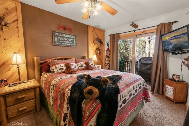 bedroom with carpet floors, access to exterior, and ceiling fan