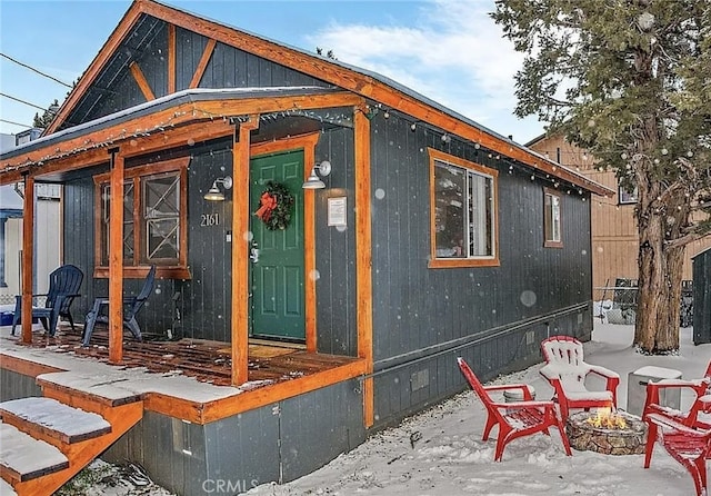 exterior space with a fire pit