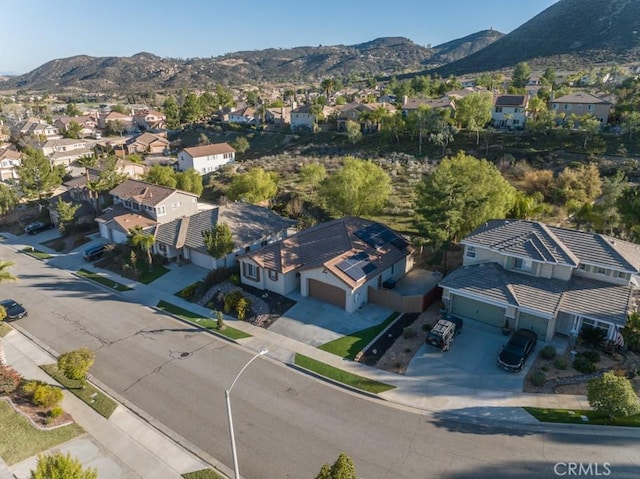 bird's eye view featuring a residential view and a mountain view