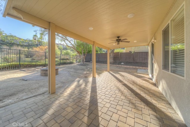 view of patio / terrace with a ceiling fan and a fenced backyard