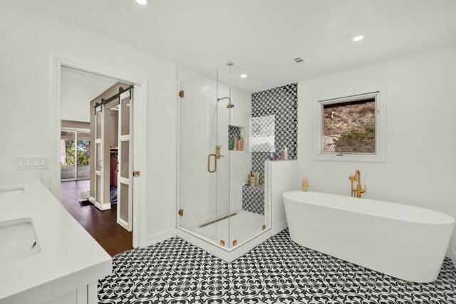 29345 Wilkes Rd, Valley Center, CA 92082 - bathroom with a shower stall, a freestanding tub, recessed lighting, and double vanity