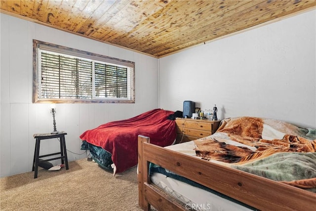 bedroom with carpet and wood ceiling