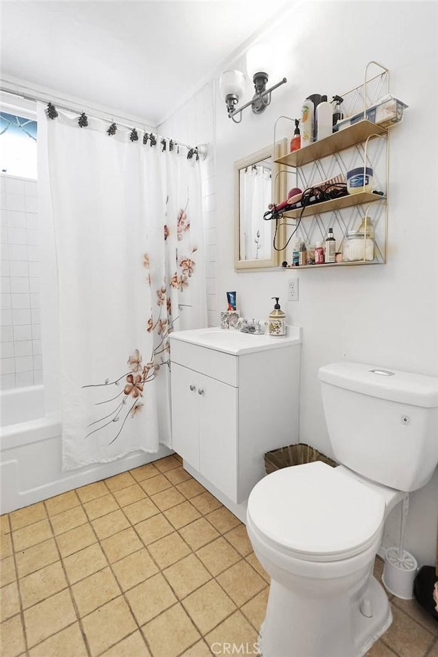 bathroom with toilet, shower / bath combo, and vanity