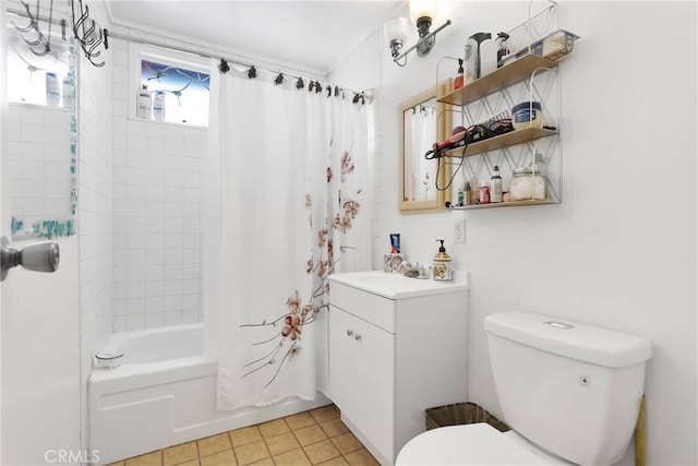 bathroom with toilet, tile patterned flooring, shower / tub combo with curtain, and vanity