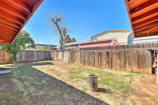 view of yard featuring a fenced backyard