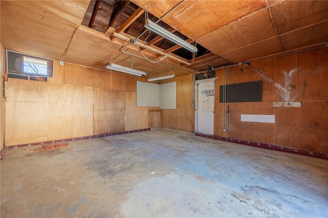 garage with wood walls