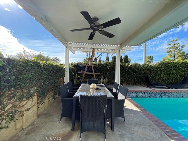 view of patio / terrace with outdoor dining space, a fenced backyard, a fenced in pool, and a pergola