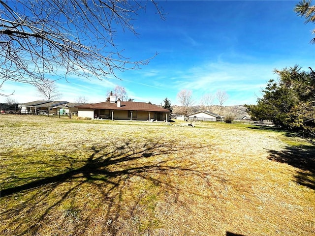 view of yard with fence