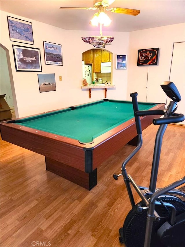 game room featuring ceiling fan and wood finished floors