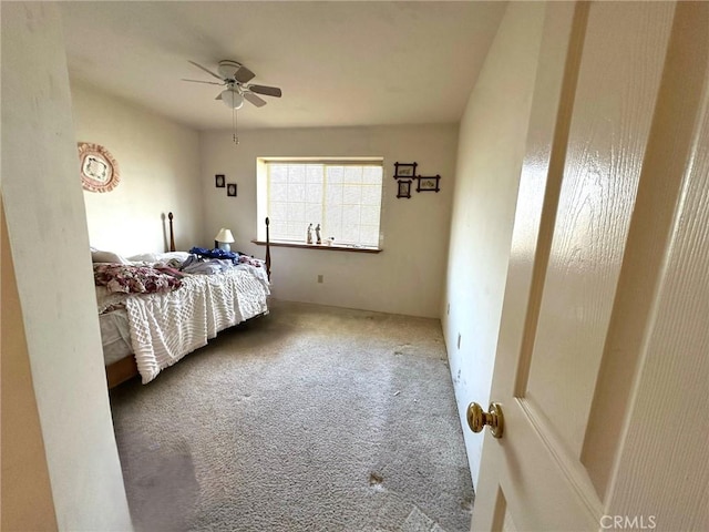 bedroom with carpet floors and a ceiling fan