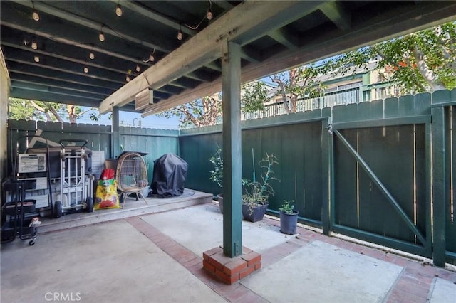 view of patio / terrace featuring area for grilling and a fenced backyard