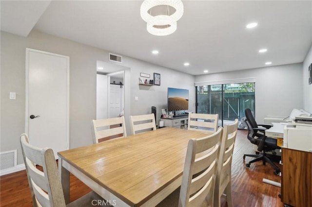 dining space featuring recessed lighting, visible vents, baseboards, and wood finished floors