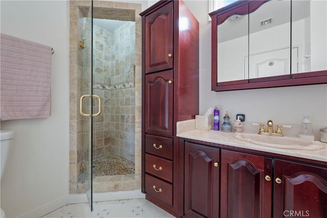 full bath featuring visible vents, a stall shower, vanity, and baseboards