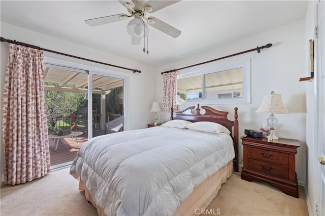 carpeted bedroom featuring a ceiling fan and access to exterior