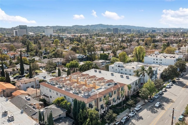 birds eye view of property featuring a mountain view