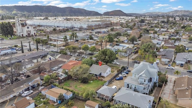 bird's eye view with a residential view and a mountain view