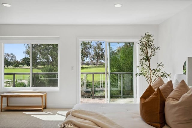 bedroom featuring access to outside, carpet, and recessed lighting