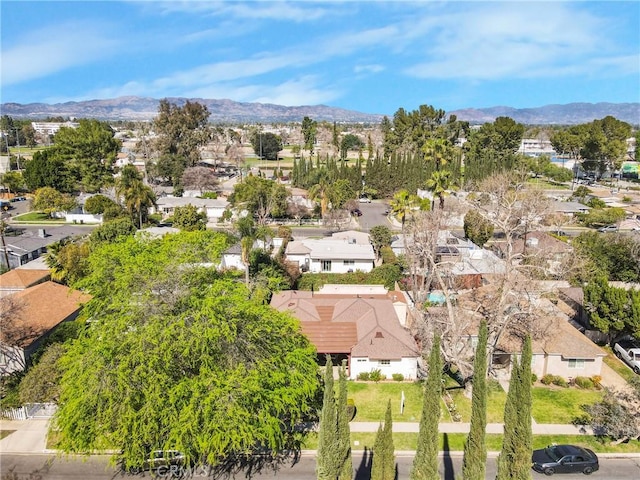 drone / aerial view with a residential view and a mountain view