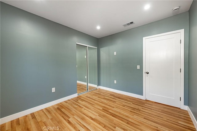 3722 Degnan Blvd, Los Angeles, CA 90018 - unfurnished bedroom featuring light wood-type flooring, baseboards, and recessed lighting