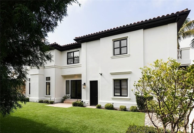31 Vista Tramonto, Newport Coast, CA 92657 - back of house featuring stucco siding and a yard