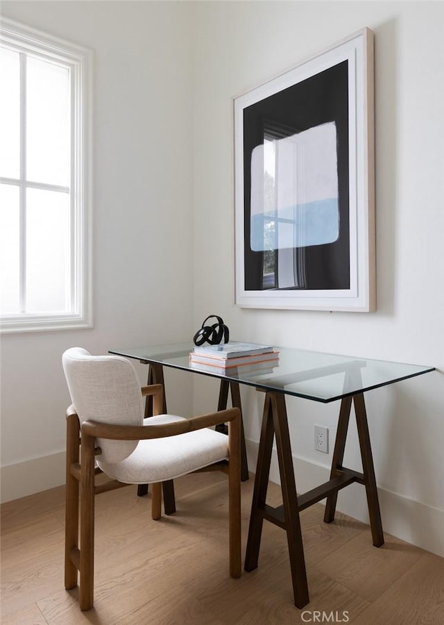 31 Vista Tramonto, Newport Coast, CA 92657 - dining area featuring light wood-type flooring, a desk, and baseboards