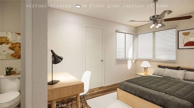 bedroom featuring wood finished floors