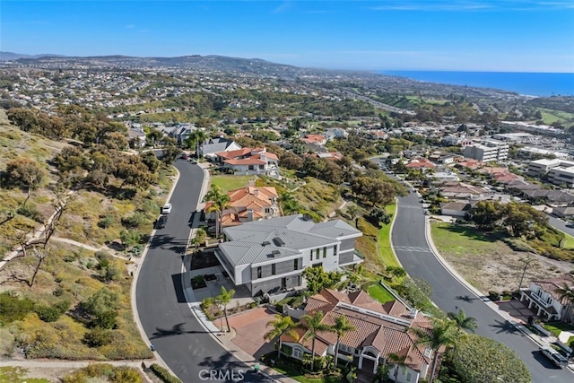 drone / aerial view featuring a mountain view and a residential view