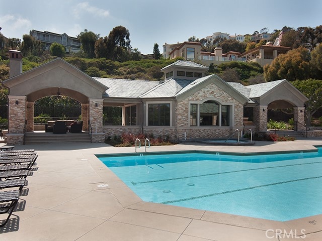 pool featuring a patio