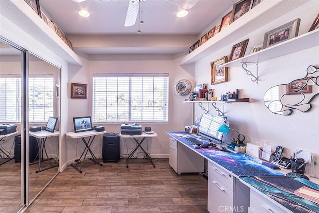 office area featuring a wealth of natural light, recessed lighting, baseboards, and wood finished floors