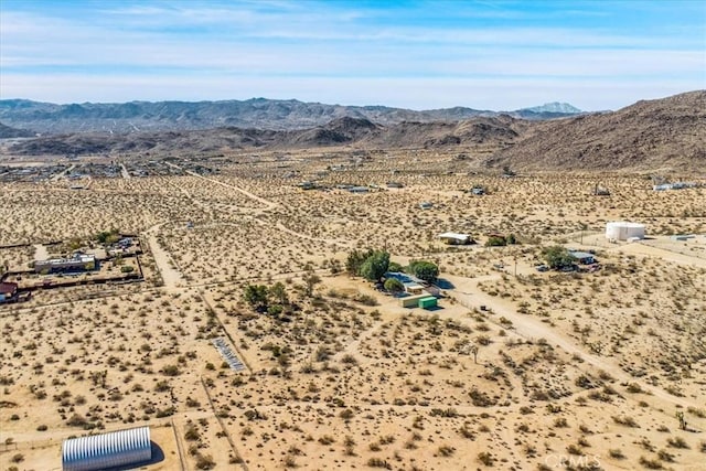 bird's eye view featuring view of desert and a mountain view