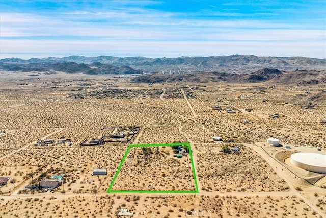 bird's eye view featuring view of desert and a mountain view