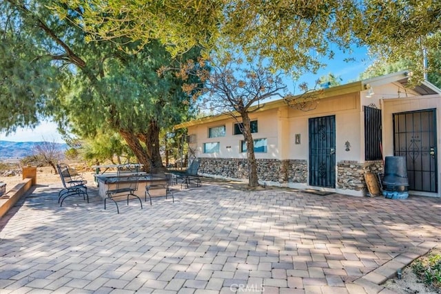 view of patio with a mountain view