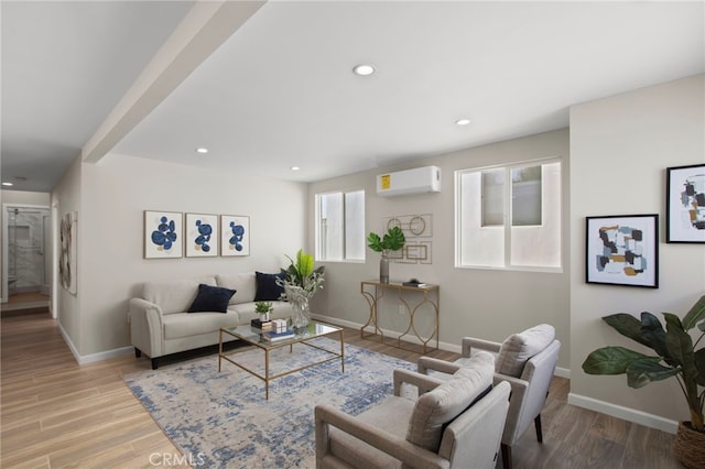 living room featuring recessed lighting, baseboards, wood finished floors, and a wall mounted AC