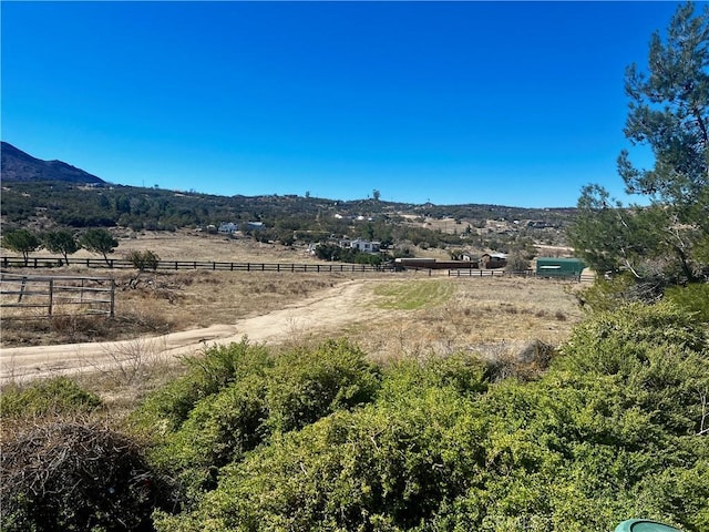 view of mountain feature with a rural view