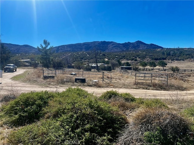 property view of mountains featuring a rural view