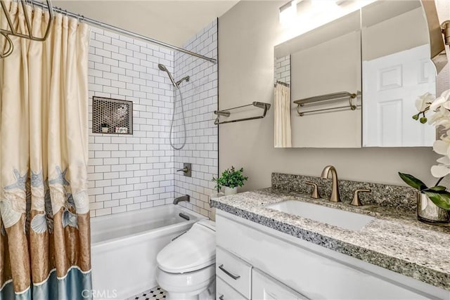 full bath with toilet, shower / bath combo with shower curtain, and vanity