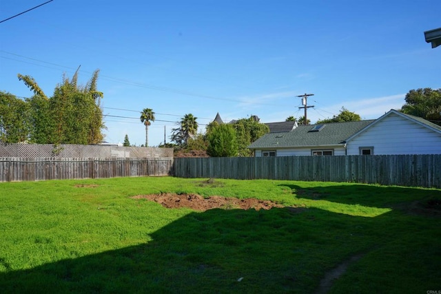 view of yard featuring fence