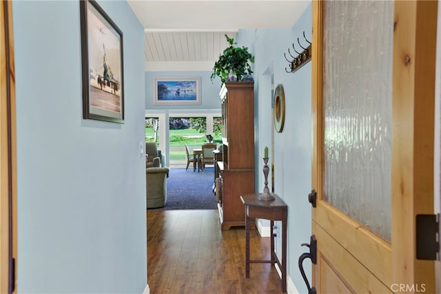 hall featuring wood finished floors