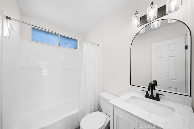 bathroom featuring toilet, shower / tub combo with curtain, and vanity